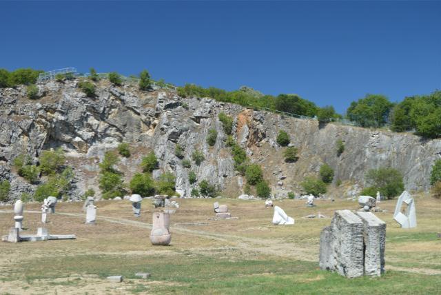 Big stone culptures in a green park