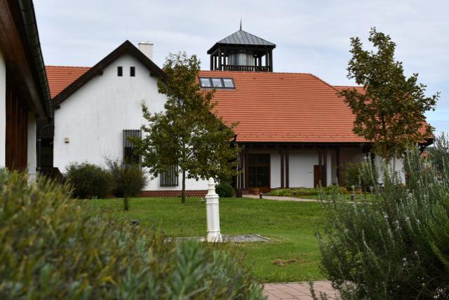 Old Drava Visitor Centre building with park